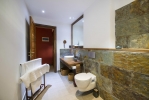 Ванная комната в The Barefoot Eco Hotel