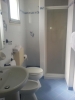 Ванная комната в Sporting Baia Hotel