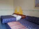 Кровать или кровати в номере Sporting Baia Hotel