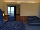 Кровать или кровати в номере Kalos Hotel