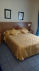 Кровать или кровати в номере Hotel Sabbie d'Oro