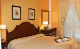 Кровать или кровати в номере Villa Daphne
