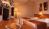 Кровать или кровати в номере Xperience Kiroseiz Premier Naama Bay