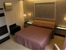Кровать или кровати в номере Hotel Santa Lucia Le Sabbie d'Oro