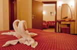 Кровать или кровати в номере Ljuljak Hotel