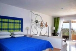 Кровать или кровати в номере Belvedere Gerakas Luxury Suites