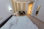 Кровать или кровати в номере Hotel Mariksel