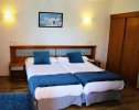 Кровать или кровати в номере Hotel Marbel