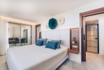Кровать или кровати в номере Iberostar Selection Playa de Muro Village
