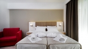 Кровать или кровати в номере Olympus Thalassea Hotel