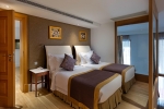 Кровать или кровати в номере Titanic Mardan Palace