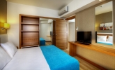 Кровать или кровати в номере Grand Park Lara Hotel