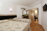 Кровать или кровати в номере Monte Carlo Hotel