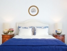 Кровать или кровати в номере Caramel Grecotel Boutique Resort