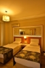 Кровать или кровати в номере KAILA BEACH HOTEL All Inclusive