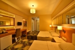 Кровать или кровати в номере KAILA BEACH HOTEL All Inclusive