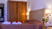 Кровать или кровати в номере Blue Sea Beach Hotel