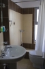 Ванная комната в Titania Hotel