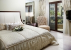 Кровать или кровати в номере Pomegranate Wellness Spa Hotel