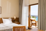 Кровать или кровати в номере Possidi Holidays Resort & Suite Hotel