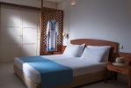 Кровать или кровати в номере Avra Collection Hermes Hotel
