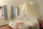 Кровать или кровати в номере Candia Park Village