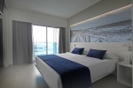 Кровать или кровати в номере Tonga Tower Design Hotel & Suites