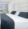 Кровать или кровати в номере Tasia Maris Oasis
