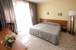 Кровать или кровати в номере Izola Paradise Hotel - All Inclusive