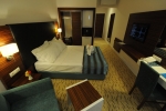 Кровать или кровати в номере Palm Wings Kusadasi Beach Resort&Spa