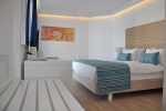 Кровать или кровати в номере Garcia Resort & Spa - Ultra All Inclusive