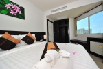 Кровать или кровати в номере APK Resort