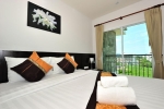 Кровать или кровати в номере APK Resort