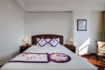Кровать или кровати в номере TTC Hotel Premium Phan Thiet