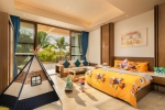 Кровать или кровати в номере Aloha Oceanfront Suite Resort