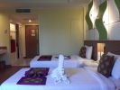 Кровать или кровати в номере Caesar Palace Hotel