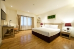 Кровать или кровати в номере Pullman Pattaya Hotel G