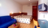 Кровать или кровати в номере Hotel Blaucel