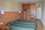 Кровать или кровати в номере Hotel Samba