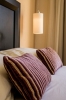 Кровать или кровати в номере Jaz Makadi Saraya Palms