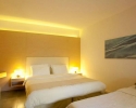Кровать или кровати в номере Capo Bay Hotel