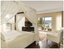 Кровать или кровати в номере Rixos Premium Bodrum