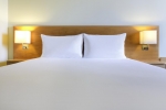 Кровать или кровати в номере Ibis Al Rigga