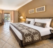 Кровать или кровати в номере Jaz Makadi Saraya Resort