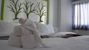 Кровать или кровати в номере The Silk Hill Hotel