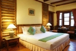 Кровать или кровати в номере Botany Beach Resort