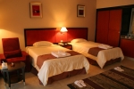 Кровать или кровати в номере Rehana Royal Beach Resort - Aquapark & Spa