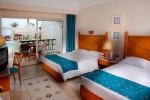 Кровать или кровати в номере Coral Beach Resort Montazah (Ex. Rotana)