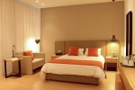 Кровать или кровати в номере Crystal Springs Beach Hotel