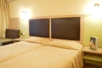 Кровать или кровати в номере Hotel Gergana - All Inclusive